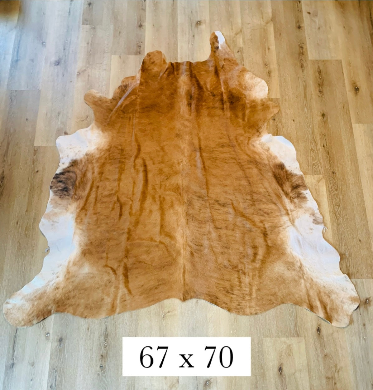 Tan Brindle Cowhide area rug.