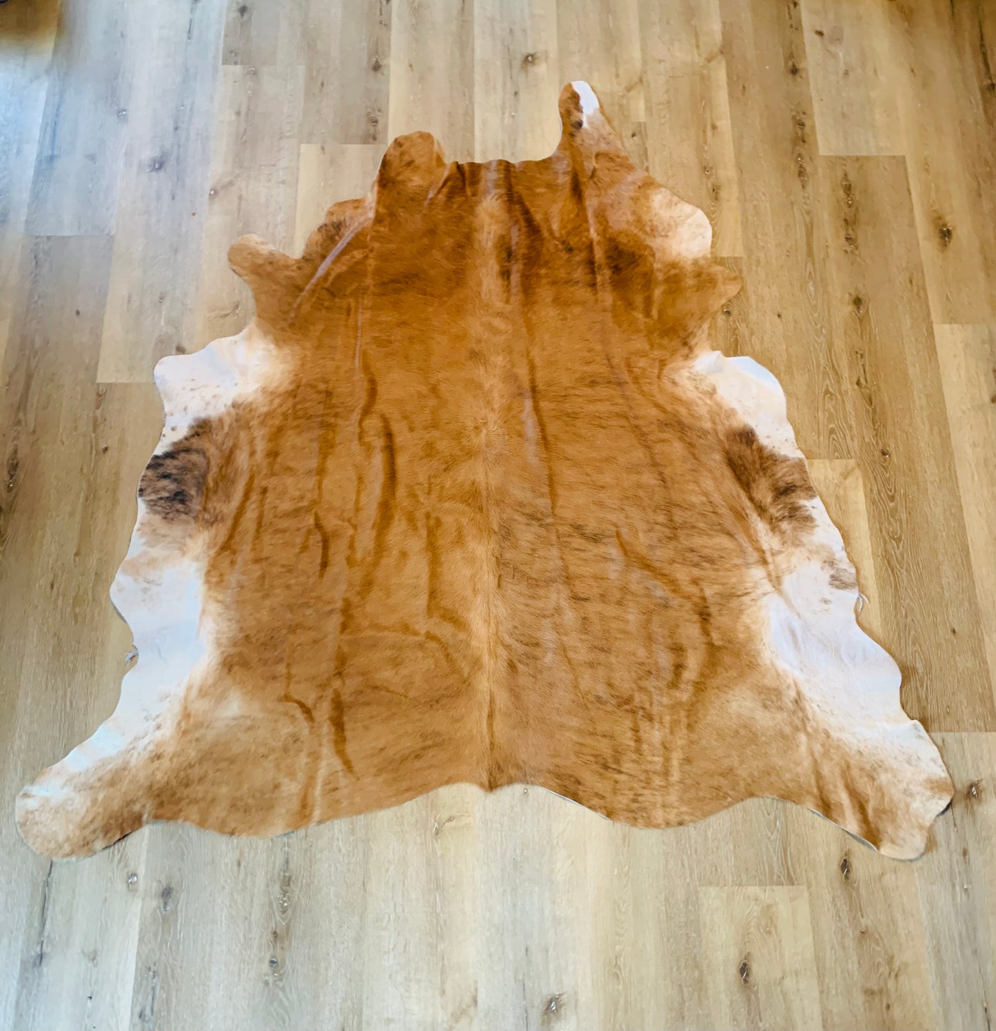 Tan Brindle Cowhide area rug.